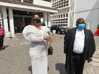 Nana Agradaa with her lawyer outside the courtroom