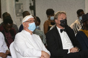 Rev. Fr. Campbell is seen here with Marc Stubbe, CEO of AfricaWeb during the event