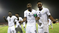 Shafiu Mumuni, center, of Ghana celebrates after scoring one of three goals against Ivory Coast