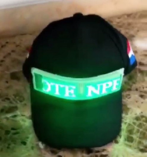 The black face cap with the inscriptions 'Vote NPP'