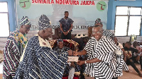 Savannah Regional Minister, Adam Braimah Salifu making the presentation