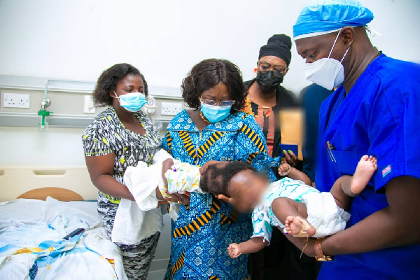 Chief of Staff, Frema Opare with the conjoined twins