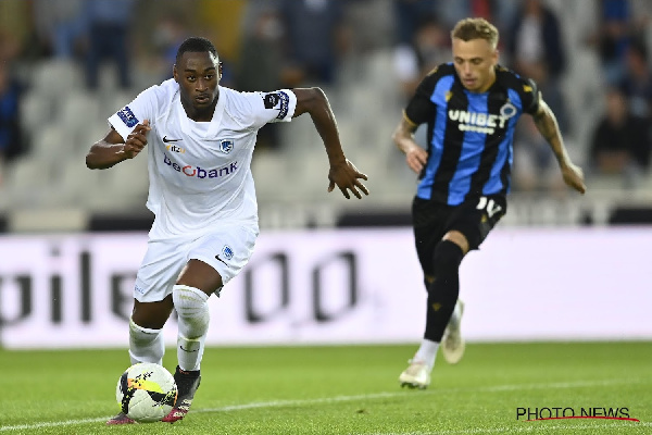 Genk defender, Mujaid Aliu Sadick in action against Club Brugge