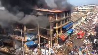 Building in Makola in flames