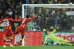 Asamoah Gyan hit the crossbar in the penalty awarded in the dying moments of the game