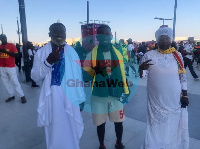 Thomas Partey's parents pictured with Samuel Ziga (M)