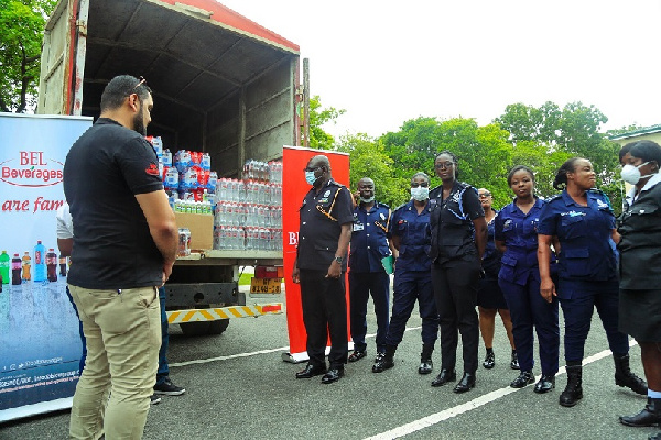 Officials of BlowChem Industries Limited with some personnel of the Ghana Police Service