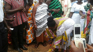 Madam Patricia Appiagyei cuts sod for the project