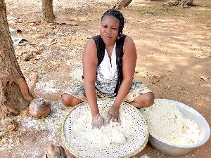 The art of making gari requires hours of constant tending over smoky, hot metal pans