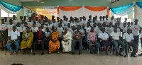 Participants and World Vision officials in a group photograph