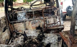 A file photo of a burnt car