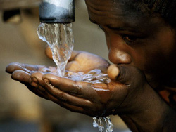 A number of people consume water from tapes