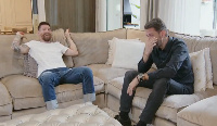 Argentinian journalist, Pablo Giralt(in black) and Lionel Messi  during the interview