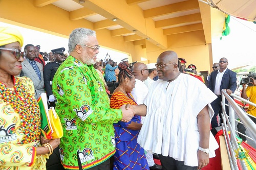 President Nana Addo Dankwa Akufo-Addo shakes hands with former President Rawlings.