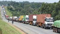 Slow Covid-19 testing result in long queues such as this on Bungoma-Malaba highway, (PHOTO | NMG)