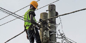 ECG official works on an electric pole | File photo