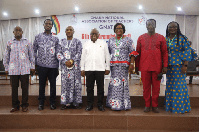 President Akufo-Addo flanked by GNAT officers and other officials of government