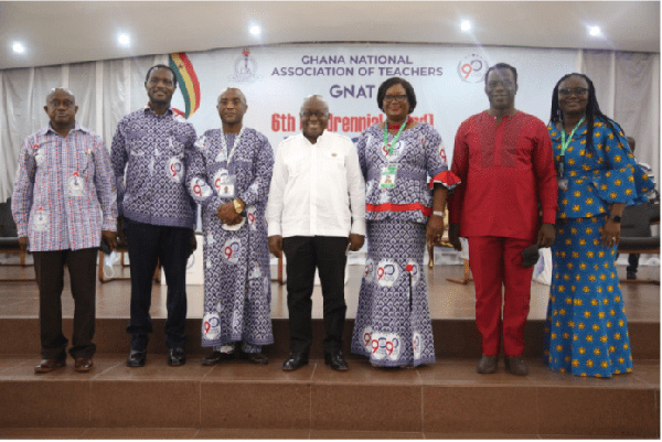 President Akufo-Addo flanked by GNAT officers and other officials of government