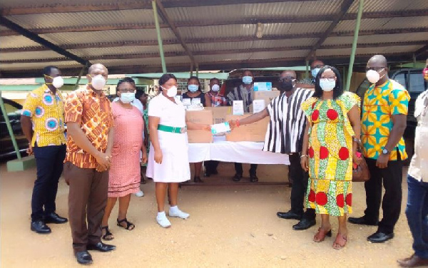 Madam Rita Botsoe receiving the items from Togbe Awalie III