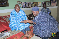 Northern Regional Minister, Salifu Sae-ed in a handshake with the Kampakuya-Naa