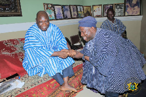 Northern Regional Minister, Salifu Sae-ed in a handshake with the Kampakuya-Naa