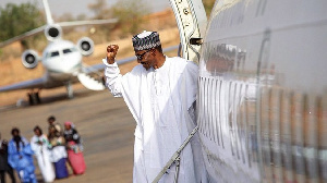 President Muhammadu Buhari getting on a plane