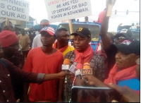 The demonstrators speaking to the media