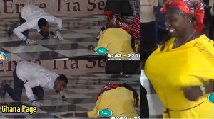 Rev Obofour checks if lady's breast is on the tiled floor