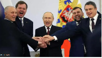 Putin and di four pipo e put in charge of di annexed region