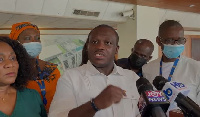 Sam Nartey George addressing the media earlier in parliament