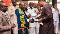 Rev. Sam Korankye Ankrah in a handshake with Vice President Bawumia at the Royal House Chapel