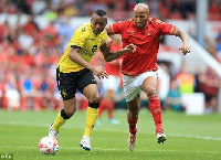 Jordan Ayew battles Kevin Wilson for the ball