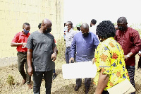 Minister of Works and Housing, Francis Asenso-Boakye and team at the site