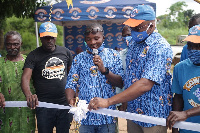 Sales Control Manager, Mr. Happy Dzah officially commissions the borehole