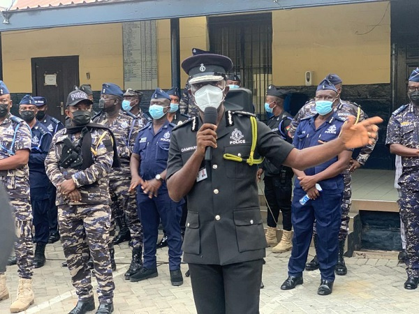 Dr George Akuffo Dampare speaking to his officers before the demonstration