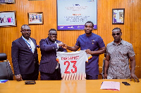 CEO of Ghana Post, Bice Osei Kuffor (second) from left with officials of Okwahu United