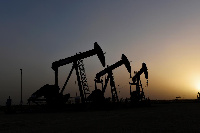 Oil tumbled for a third session as panic over the spreading coronavirus gripped investors