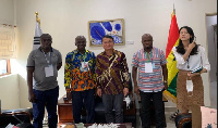 Ahafo Regional Minister, George Boakye in a photograph with South African and Denmark investors