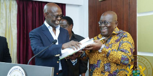 Dr. Kwesi Botchwey presenting the National Development Plan to Akufo-Addo