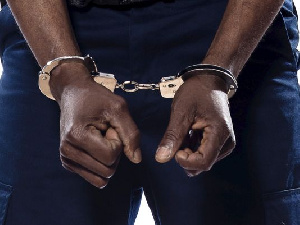 File photo of a person in handcuffs