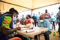 President Akufo-Addo and wife at voter registration center going through the process