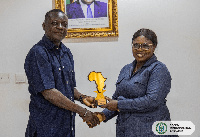 Mrs. Florence Kuukyi receiving her award