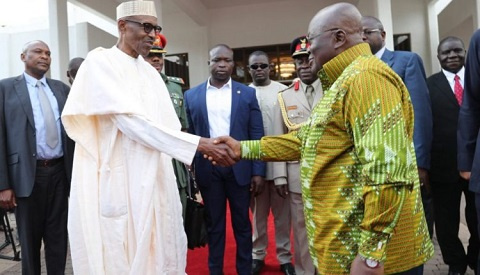 President Nana Addo Dankwa Akufo-Addo in a handshake with President Buhari