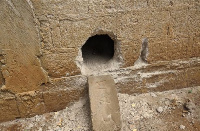 The hole the suspected thief created in the church edifice.