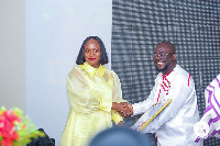 Ms. Patricia Ofori-Atta receiving her award