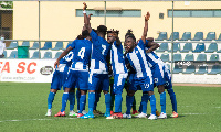 Accra Great Olympics players prepare for a league game