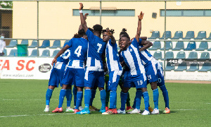 Accra Great Olympics players prepare for a league game