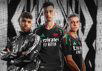 Raya, Martinelli, Trossard wearing the new kit