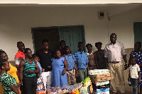 Rashid Sumaila with some of the children at the orphanage