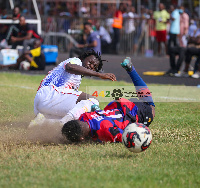 Sulley Muntari fouls Legon Cities player